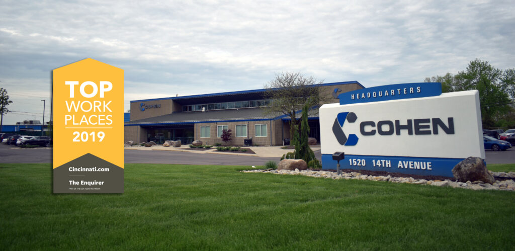 Yellow Top Workplaces Badge superimposed over photo of Cohen headquarters building